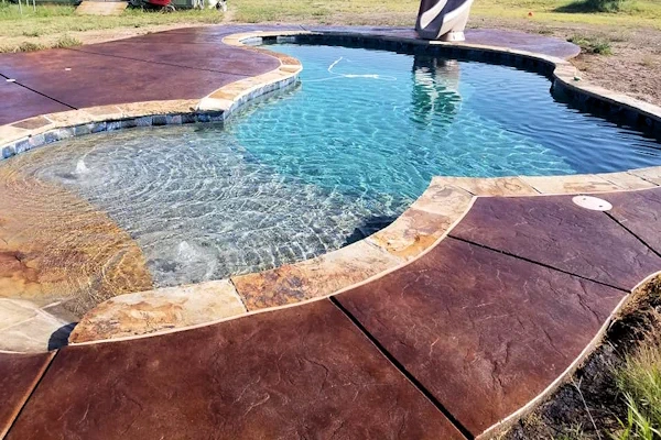 Polished and stained concrete pool deck.