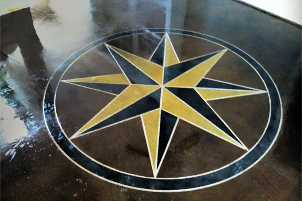 Large, colorful star-like symbol.