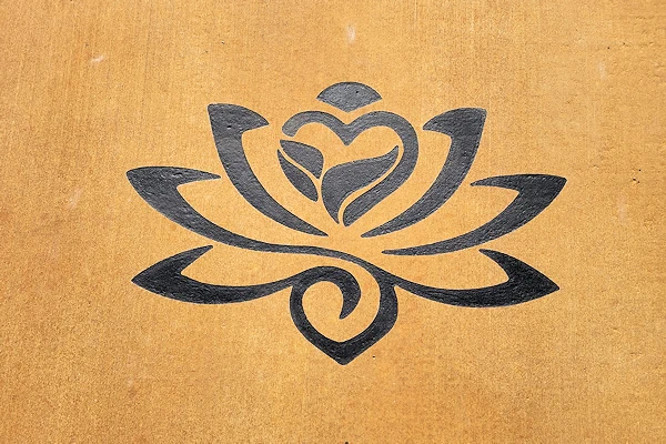 A stylized rose symbol